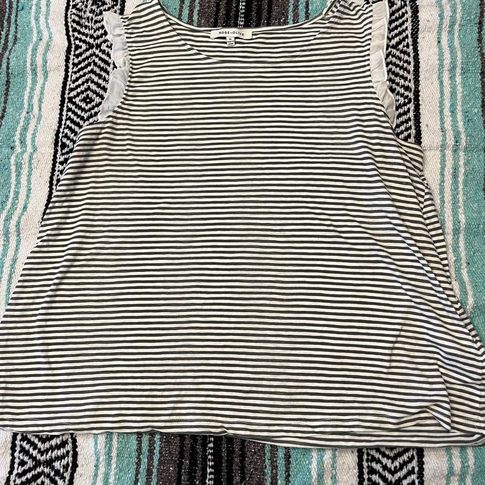 Gray and white striped sleeveless shirt with ruffle sleeves